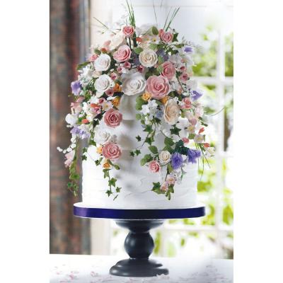 Wedding Cake Decorated with Sugar Thistles, Roses, Cherry Blossom and Freesia.