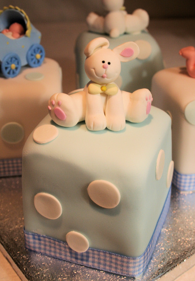 Claydough Rabbit sitting on a parcel cake