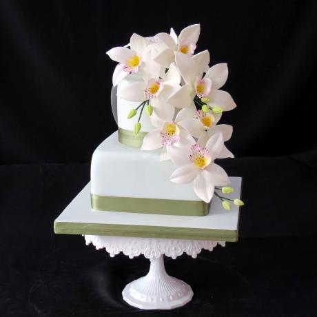 Vintage Green Iced Cake decorated with sugar orchids.